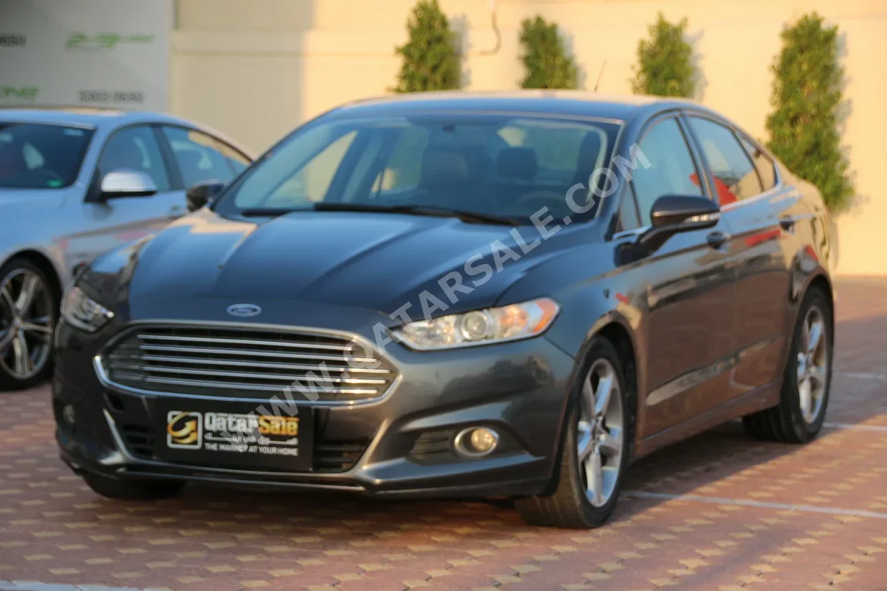 Ford  Fusion  2015  Automatic  300,000 Km  4 Cylinder  Front Wheel Drive (FWD)  Sedan  Gray