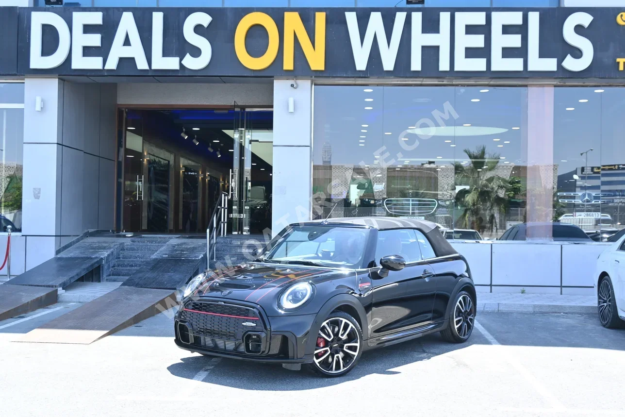 Mini  Cooper  JCW  2022  Automatic  15,000 Km  4 Cylinder  Front Wheel Drive (FWD)  Convertible  Black  With Warranty