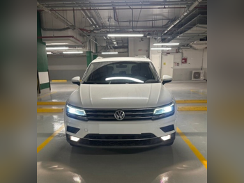 Volkswagen  Tiguan  2.0 TSI  2020  Automatic  92,522 Km  4 Cylinder  All Wheel Drive (AWD)  SUV  White  With Warranty