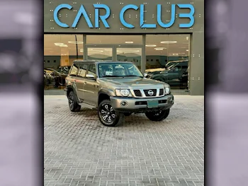 Nissan  Patrol  Super Safari  2024  Automatic  0 Km  6 Cylinder  Four Wheel Drive (4WD)  SUV  Gold  With Warranty