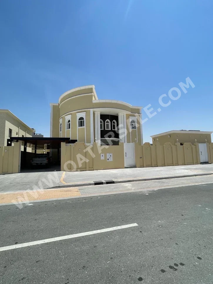 سكن عائلي  - غير مفروشة  - الوكرة  - ام بشير  - 12 غرف نوم