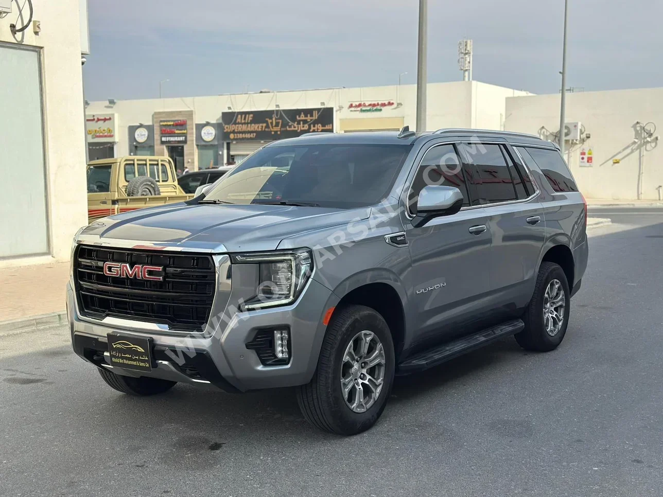 GMC  Yukon  SLE  2023  Automatic  26,000 Km  8 Cylinder  Rear Wheel Drive (RWD)  SUV  Gray  With Warranty