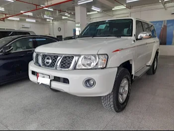 Nissan  Patrol  Safari  2023  Automatic  10,000 Km  6 Cylinder  Four Wheel Drive (4WD)  SUV  White  With Warranty