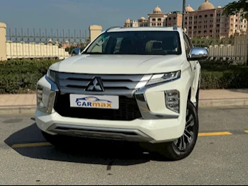 Mitsubishi  Pajero  Montero Sport  2023  Automatic  0 Km  6 Cylinder  Four Wheel Drive (4WD)  SUV  White  With Warranty