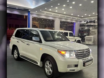  Toyota  Land Cruiser  GX  2011  Automatic  300,000 Km  6 Cylinder  Four Wheel Drive (4WD)  SUV  Pearl  With Warranty