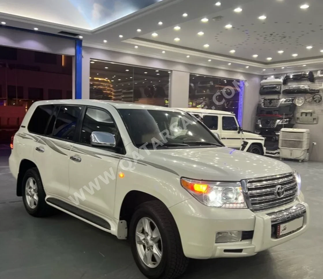  Toyota  Land Cruiser  GX  2011  Automatic  300,000 Km  6 Cylinder  Four Wheel Drive (4WD)  SUV  Pearl  With Warranty