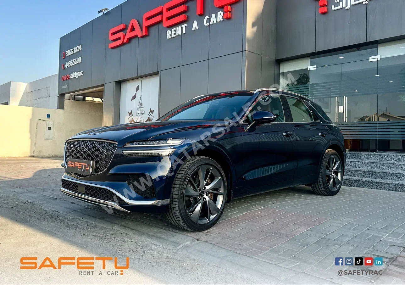 Genesis  GV70  4 Cylinder  SUV ( AWD )  Dark Blue  2025