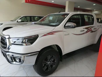 Toyota  Hilux  2025  Automatic  240 Km  4 Cylinder  Four Wheel Drive (4WD)  Pick Up  White  With Warranty