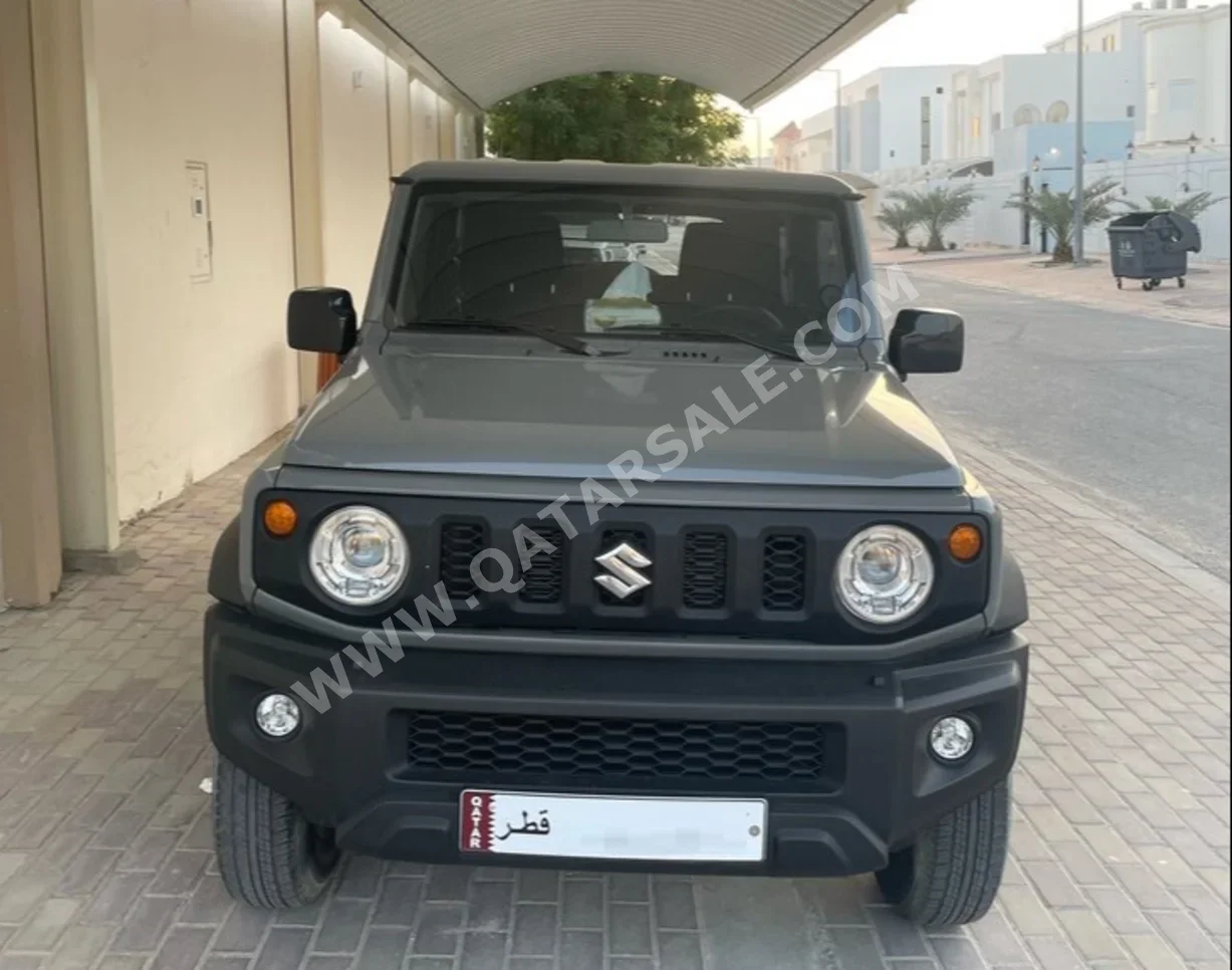 Suzuki  Jimny  2024  Automatic  44,000 Km  4 Cylinder  Four Wheel Drive (4WD)  SUV  Gray  With Warranty