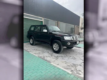 نيسان  باترول  سفاري  2006  اوتوماتيك  360,000 كم  6 سلندر  دفع رباعي  اس يو في  أسود