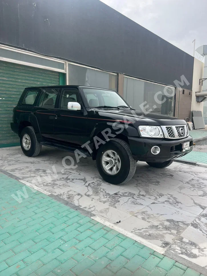 نيسان  باترول  سفاري  2006  اوتوماتيك  360,000 كم  6 سلندر  دفع رباعي  اس يو في  أسود