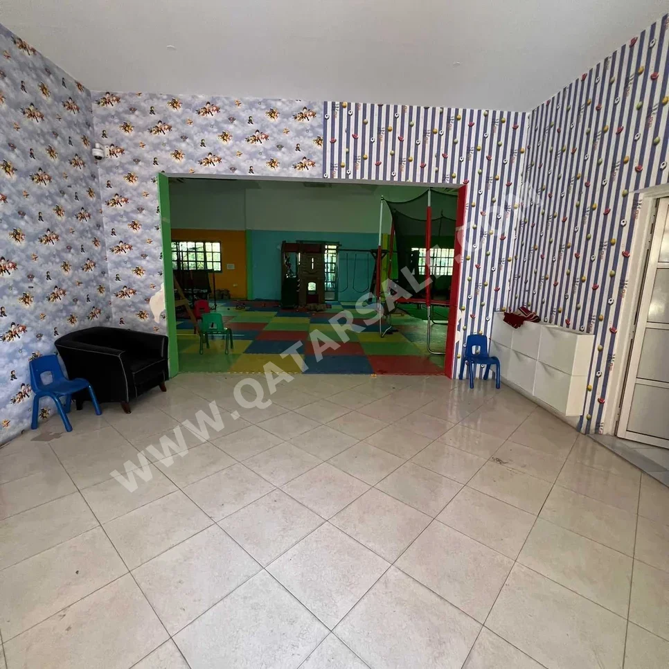 2 Bedrooms  Apartment  in Doha -  Umm Ghuwailina  Not Furnished
