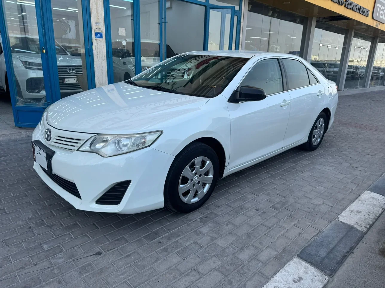 Toyota  Camry  GL  2014  Automatic  243,000 Km  4 Cylinder  Front Wheel Drive (FWD)  Sedan  White