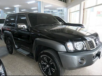 Nissan  Patrol  Super Safari  2023  Automatic  5,000 Km  6 Cylinder  Four Wheel Drive (4WD)  SUV  Black  With Warranty