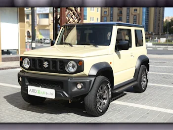 Suzuki  Jimny  2022  Automatic  70,000 Km  4 Cylinder  Four Wheel Drive (4WD)  SUV  Black and Beige  With Warranty