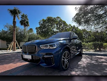 BMW  X-Series  X5 M50i  2023  Automatic  9,250 Km  8 Cylinder  All Wheel Drive (AWD)  SUV  Blue  With Warranty