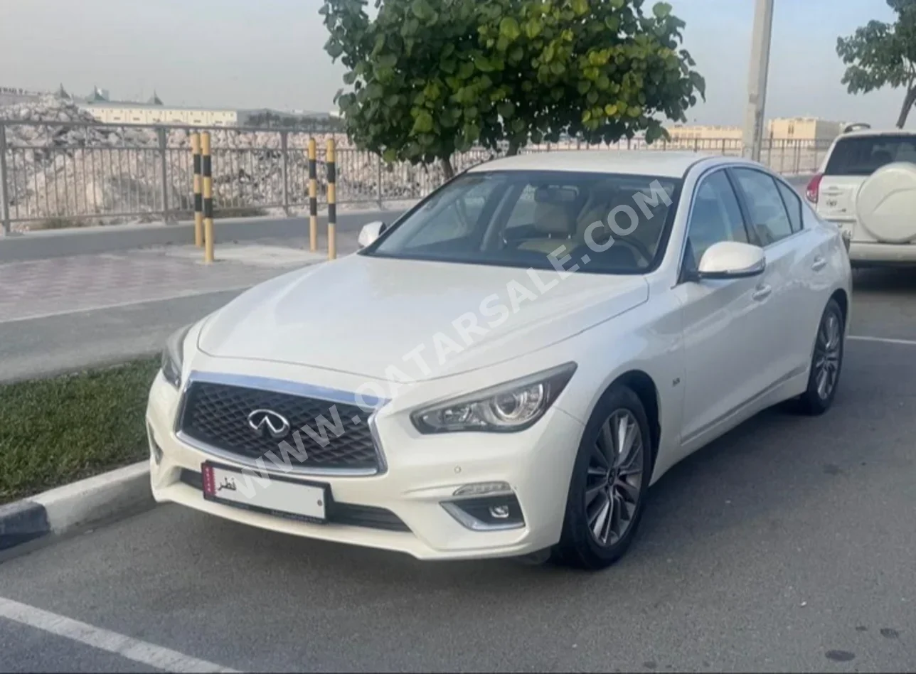 Infiniti  Q  50  2018  Automatic  9,900 Km  4 Cylinder  Rear Wheel Drive (RWD)  Sedan  White