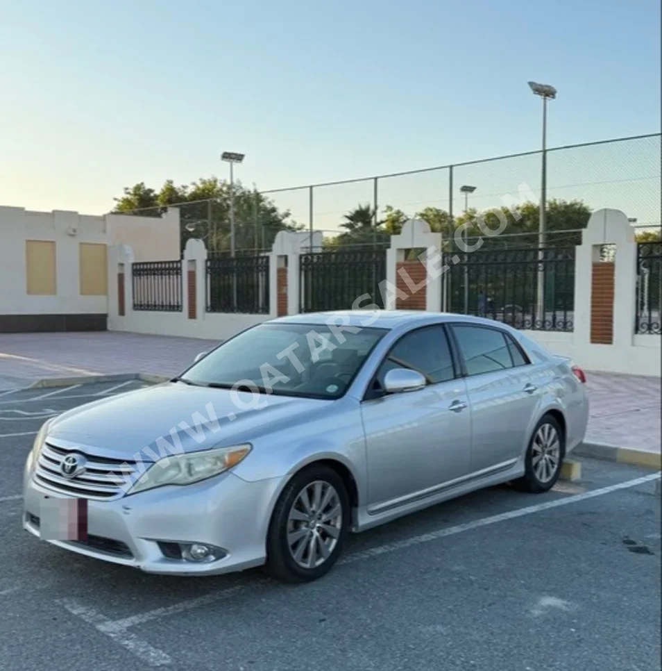 Toyota  Avalon  Limited  2011  Automatic  148,000 Km  6 Cylinder  Front Wheel Drive (FWD)  Sedan  Silver