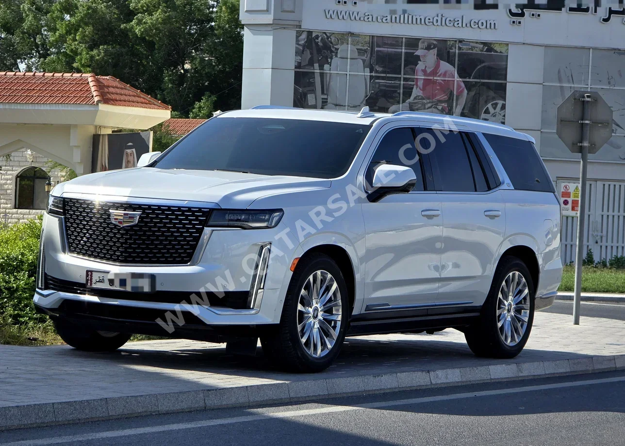 Cadillac  Escalade  Premium  2022  Automatic  58,000 Km  8 Cylinder  Four Wheel Drive (4WD)  SUV  White  With Warranty