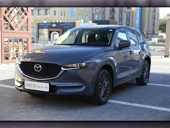 Mazda  CX  5  2022  Automatic  65,000 Km  4 Cylinder  Front Wheel Drive (FWD)  SUV  Gray  With Warranty