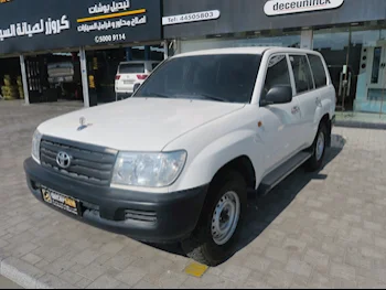 Toyota  Land Cruiser  G  2006  Manual  353,000 Km  6 Cylinder  Four Wheel Drive (4WD)  SUV  White