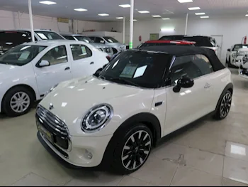 Mini  Cooper  2019  Automatic  21,000 Km  4 Cylinder  Front Wheel Drive (FWD)  Hatchback  Beige