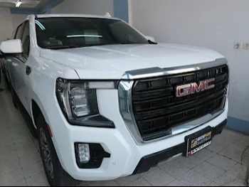 GMC  Yukon  XL  2021  Automatic  48,000 Km  8 Cylinder  Four Wheel Drive (4WD)  SUV  White