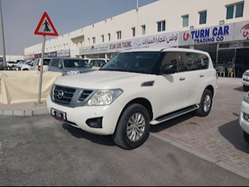 Nissan  Patrol  XE  2013  Automatic  174,000 Km  6 Cylinder  Four Wheel Drive (4WD)  SUV  White