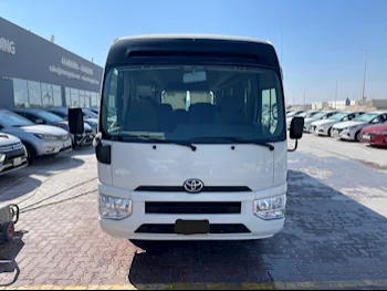 Toyota  Coaster  2021  Manual  130,000 Km  4 Cylinder  Rear Wheel Drive (RWD)  Van / Bus  White