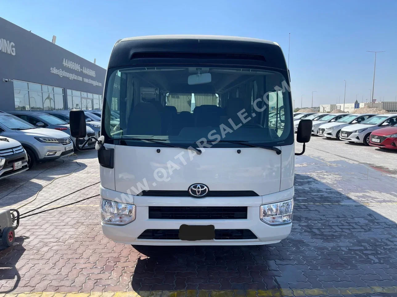 Toyota  Coaster  2021  Manual  130,000 Km  4 Cylinder  Rear Wheel Drive (RWD)  Van / Bus  White