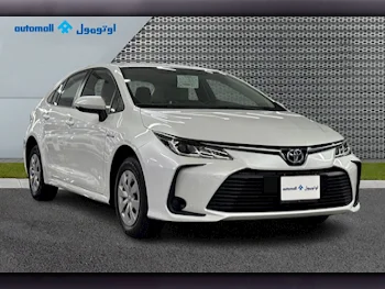 Toyota  Corolla  Hybrid  2022  Automatic  115,928 Km  4 Cylinder  Front Wheel Drive (FWD)  Sedan  White