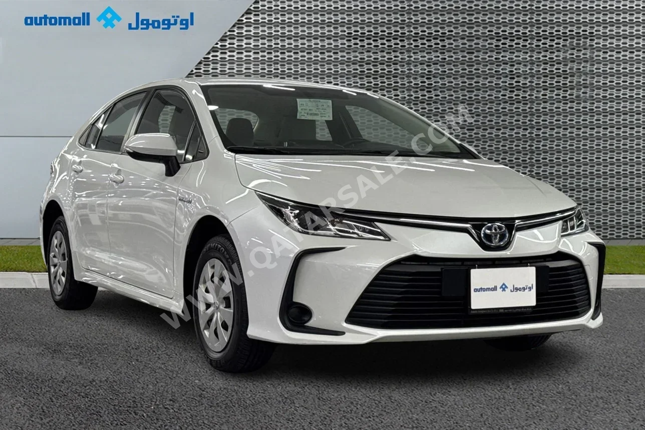 Toyota  Corolla  Hybrid  2022  Automatic  115,928 Km  4 Cylinder  Front Wheel Drive (FWD)  Sedan  White