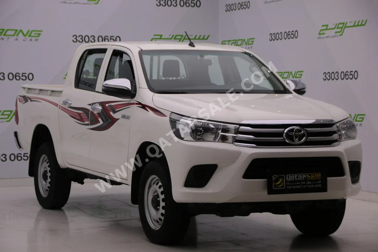 Toyota  Hilux  2023  Automatic  50,000 Km  4 Cylinder  Four Wheel Drive (4WD)  Pick Up  White  With Warranty