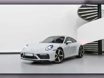 Porsche  911  Carrera  2024  Automatic  9,000 Km  6 Cylinder  Rear Wheel Drive (RWD)  Coupe / Sport  Silver  With Warranty