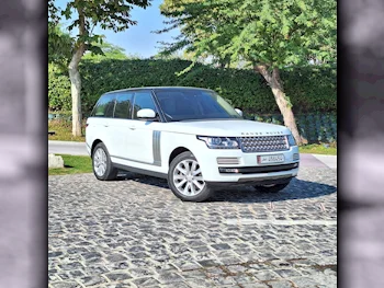 Land Rover  Range Rover  Vogue  2014  Automatic  114,000 Km  8 Cylinder  Four Wheel Drive (4WD)  SUV  White