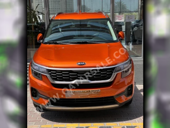 Kia  SELTOS  4 Cylinder  SUV ( AWD )  Dark Orange  2020