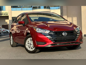 Nissan  Sunny  4 Cylinder  Sedan  Dark Red  2024
