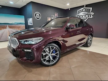 BMW  X-Series  X6  2021  Automatic  52,000 Km  6 Cylinder  Four Wheel Drive (4WD)  SUV  Maroon  With Warranty