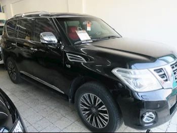 Nissan  Patrol  Platinum  2015  Automatic  221,000 Km  8 Cylinder  Four Wheel Drive (4WD)  SUV  Black