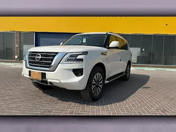 Nissan  Patrol  LE  2024  Automatic  0 Km  8 Cylinder  Four Wheel Drive (4WD)  SUV  White  With Warranty