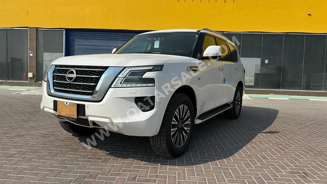 Nissan  Patrol  LE  2024  Automatic  0 Km  8 Cylinder  Four Wheel Drive (4WD)  SUV  White  With Warranty