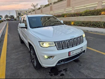 Jeep  Grand Cherokee  Overland  2017  Automatic  73,500 Km  8 Cylinder  All Wheel Drive (AWD)  SUV  White