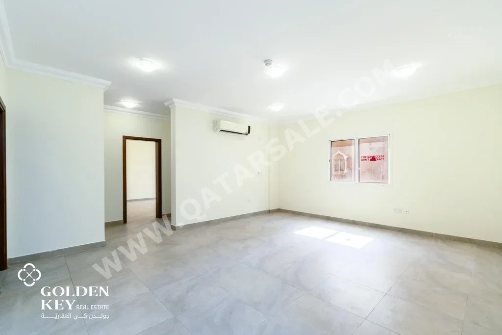 3 Bedrooms  Apartment  For Rent  in Doha -  Al Mansoura  Not Furnished