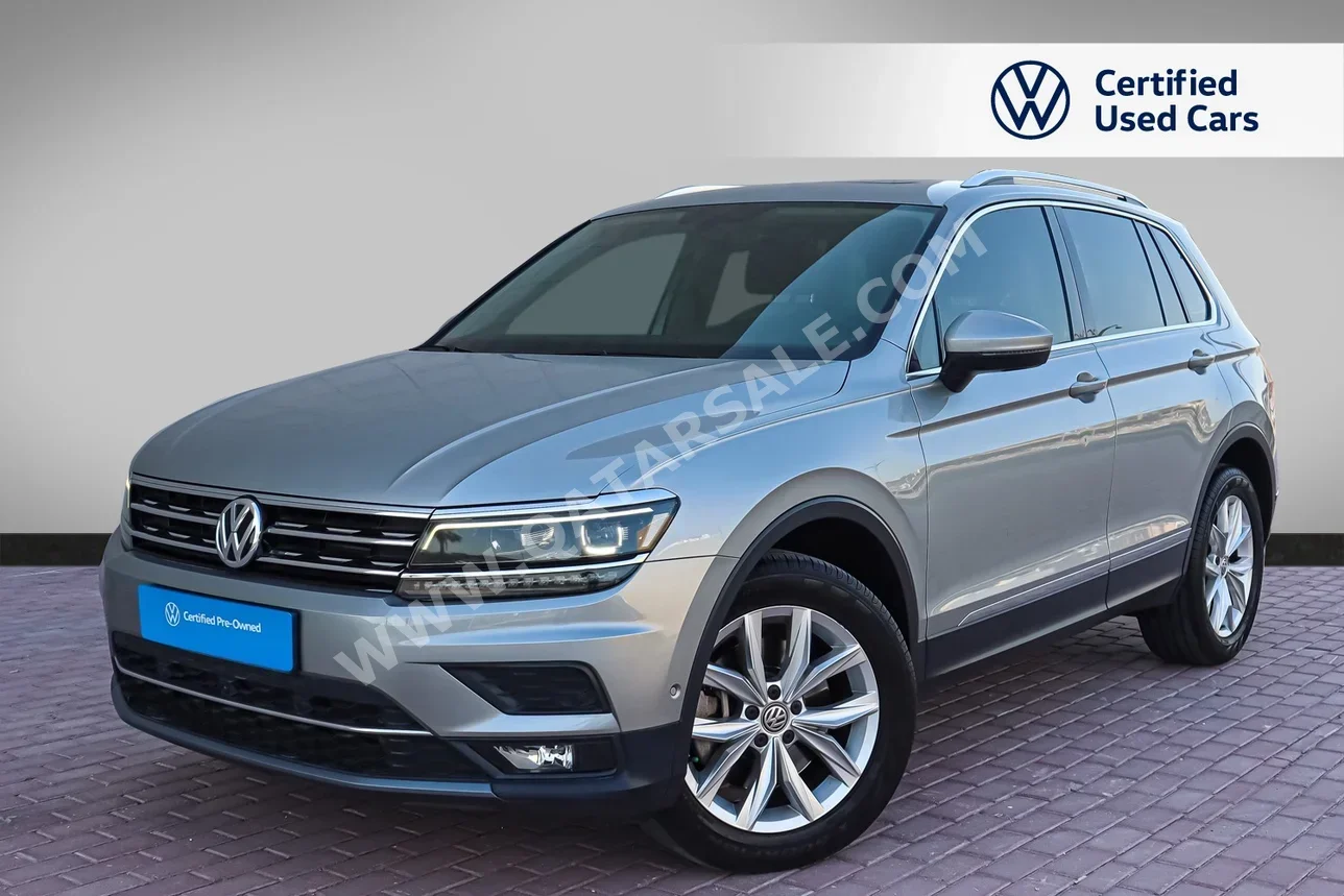 Volkswagen  Tiguan  2.0 TSI  2019  Automatic  83,000 Km  4 Cylinder  All Wheel Drive (AWD)  SUV  Silver