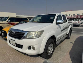 Toyota  Hilux  2014  Manual  179,000 Km  4 Cylinder  Four Wheel Drive (4WD)  Pick Up  White