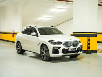 BMW  X-Series  X6  2020  Automatic  90,000 Km  6 Cylinder  Four Wheel Drive (4WD)  SUV  White  With Warranty