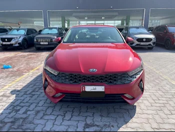 Kia  K5  2021  Automatic  54,000 Km  4 Cylinder  Front Wheel Drive (FWD)  Sedan  Red  With Warranty