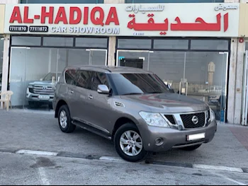 Nissan  Patrol  SE  2013  Automatic  299,000 Km  8 Cylinder  Four Wheel Drive (4WD)  SUV  Gray