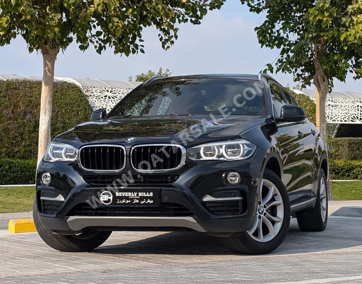 BMW  X-Series  X6 40i  2017  Automatic  86,241 Km  6 Cylinder  Four Wheel Drive (4WD)  SUV  Black  With Warranty