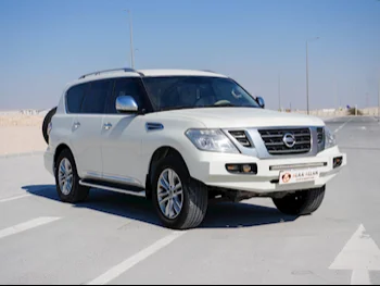 Nissan  Patrol  Platinum  2012  Automatic  304,000 Km  8 Cylinder  Four Wheel Drive (4WD)  SUV  White